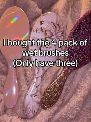 Wet brush 4 pack I bought it & tell me how I’m already missing one of my brushes!?! I had two daughters and one is MIA,