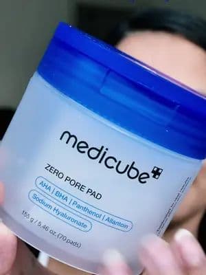 Zero pore pad 💙favourite step of my skincare this days✨ @medicube global @medicube_pr @medicube US Store 💫Benefits: Clinically tested to be effective in tightening pores. 💫Clinically tested to be hypoallergenic. 💫Formulated with natural AHA and BHA ingredients to exfoliate skin to remove skin impurities, excess sebum and dead skin cells. 💫Controls sebum production and Benefits: 💫Clinically tested to be effective in tightening pores. 💫Clinically tested to be hypoallergenic. 💫Formulated with natural AHA and BHA ingredients to exfoliate skin to remove skin impurities, excess sebum and dead skin cells. 💫Controls sebum production and tightens pores. 💫The embossed side helps exfoliate skin while the soft side helps hydrate and soothe skin. How to use: 1. After cleansing, use the embossed side to wipe over the entire face. 2. Use the softer side to massage over the skin. 3. Pat in any remaining toner onto skin for better absorption. tightens pores. The embossed side helps exfoliate skin while the soft side helps hydrate and soothe skin. How to use: 1. After cleansing, use the embossed side to wipe over the entire face. 2. Use the softer side to massage over the skin. 3. Pat in any remaining toner onto skin for better absorption. #medicube #amazon #amazonfinds #amazonmusthaves #amazonfavorites #medicubeskincare #amazonprimeday #medicubedevice #fyp #viral #creatorsearchinsights