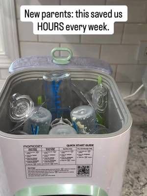This @MomcozyUK Bottle Washer & Sanitizer was recommended by one of Clayton's Physical therapists when he had surgery while I was pregnant - and somehow... it just sat in the box for a while, as we debated if we really needed it. Fast forward to finally opening it and now? We use it multiple times a day. Between bottles, pump parts, and all the little baby pieces, this thing has genuinely saved us so much time (and mental energy). Instead of standing at the sink scrubbing nonstop, we load it, press start, and move on with our day - which as new parents, is EVERYTHING. If you're expecting, newly postpartum, or deep in the bottle phase.. don't make the same mistake I did. Buy this, Open the box. You'll thank yourself later Link in the yellow cart #myfirstmomcozy #bottleclean #bottlesterilizer #TikTokMadeMeBuyIt #babymusthaves